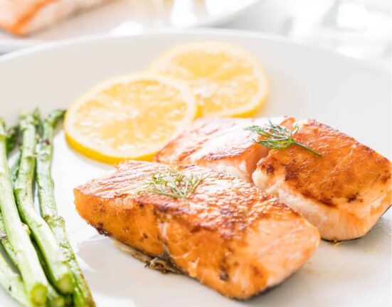 Honey Lemon Salmon on a plate with asparagus