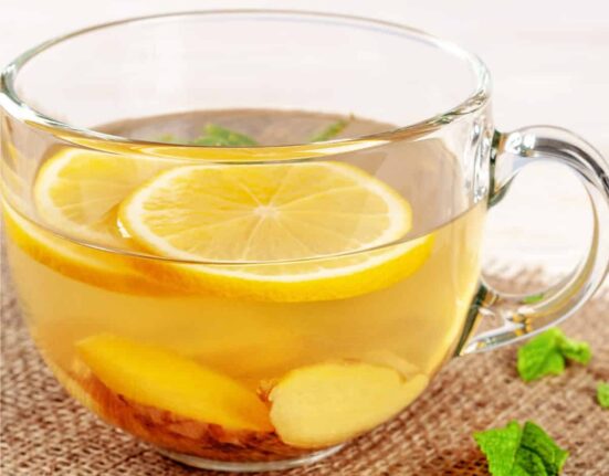 A glass mug of Lemon Ginger Tea