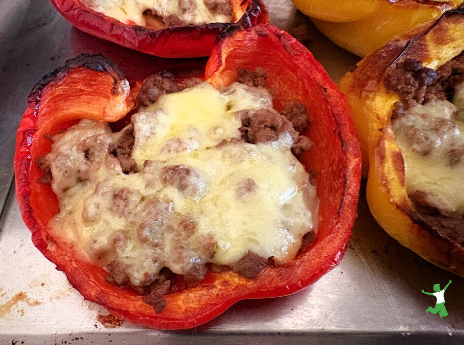 spicy stuffed bell peppers in baking pan