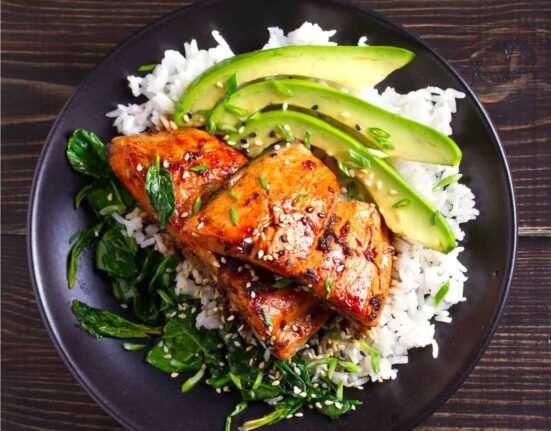 Overhead image of Sweet Chili Salmon on a a dark plate