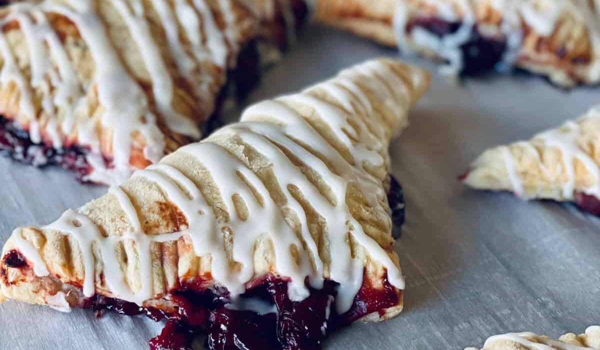 Close up image of Cherry Turnovers on parchment paper