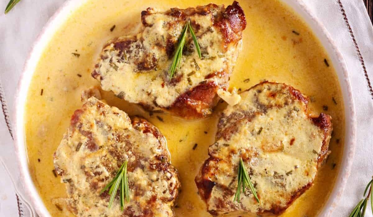 Overhead image of Creamy Pork Chops in a white bowl