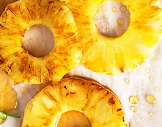 Close up image of slices of grilled pineapple
