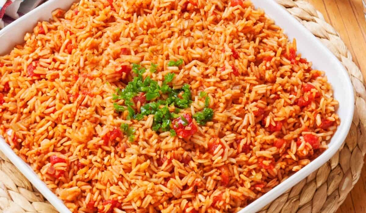 Overhead image of Spanish Rice in a square white container