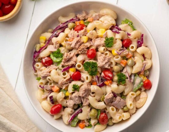 Overhead image of Tuna Macaroni Salad in a white bowl