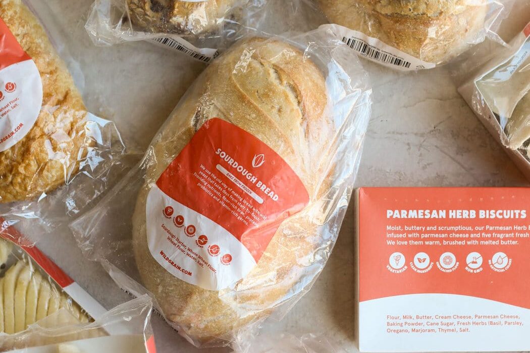Overhead view of sourdough bread loaves and products.