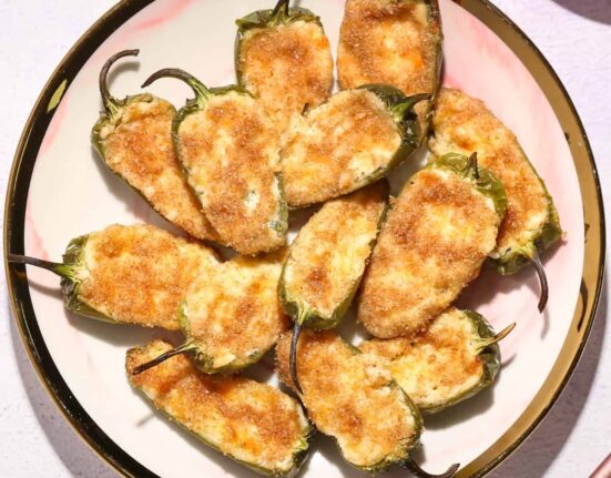 Overhead image of Baked Jalapeno Poppers on a white plate