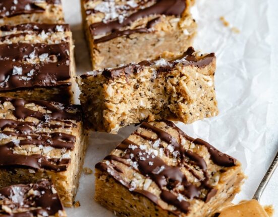 coconut chocolate protein bars on parchment paper