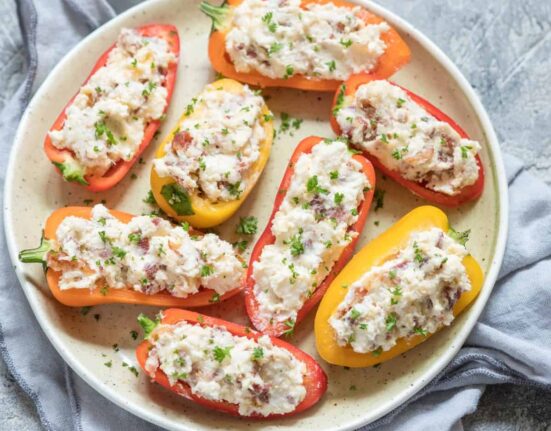 Overhead image of Stuffed Mini Peppers on a white plate