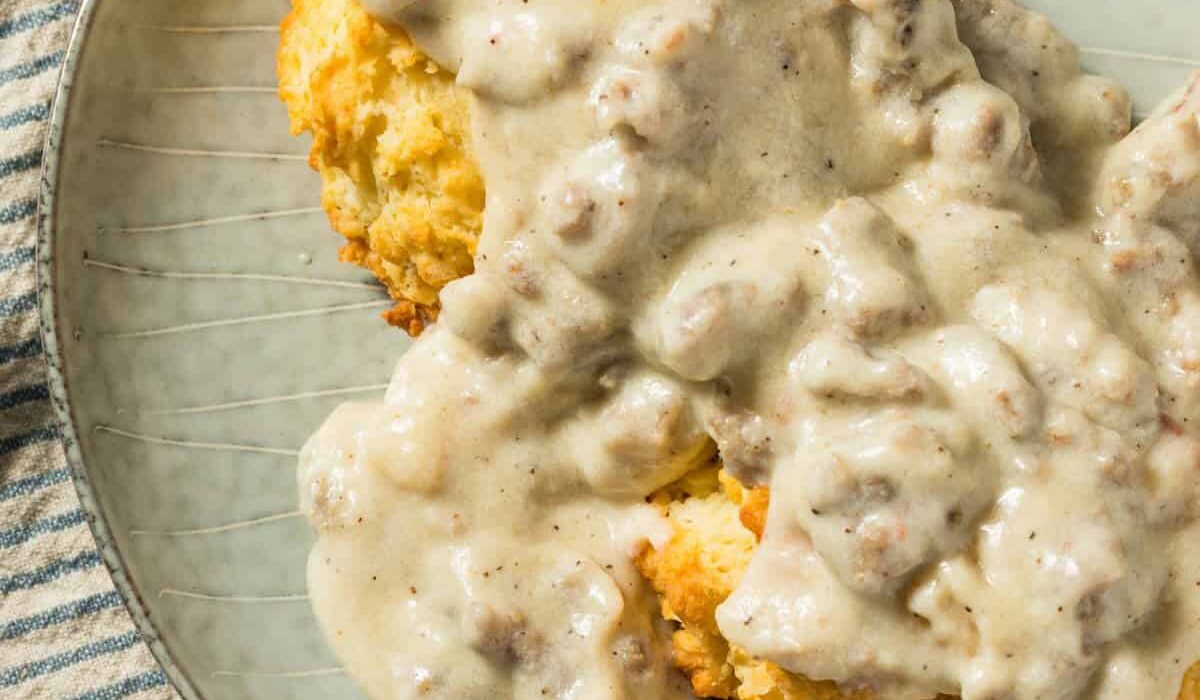 Overhead image of biscuits and gravy on a plate
