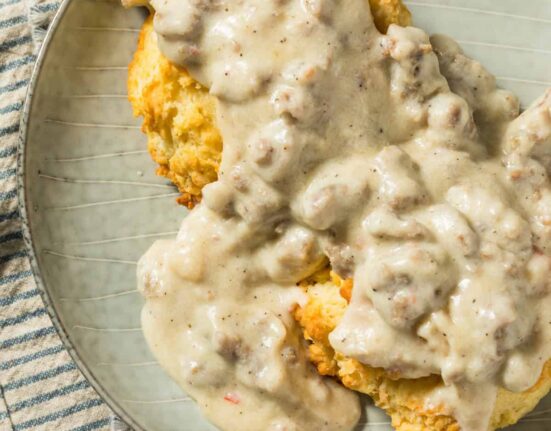 Overhead image of biscuits and gravy on a plate