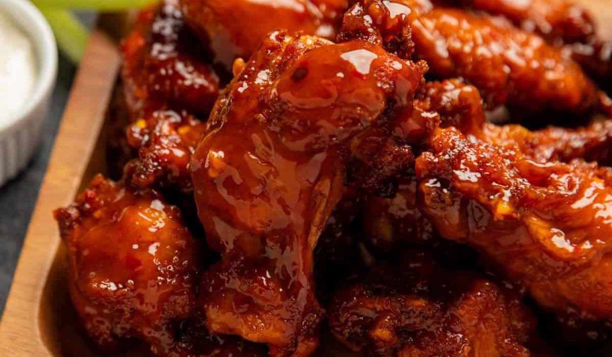 Overhead image of Mango Habanero Wings on a wooden platter