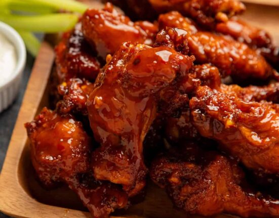 Overhead image of Mango Habanero Wings on a wooden platter