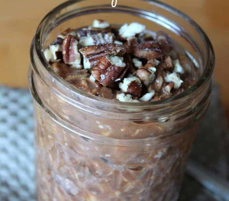 a jar of chocolate overnight oats with dates.