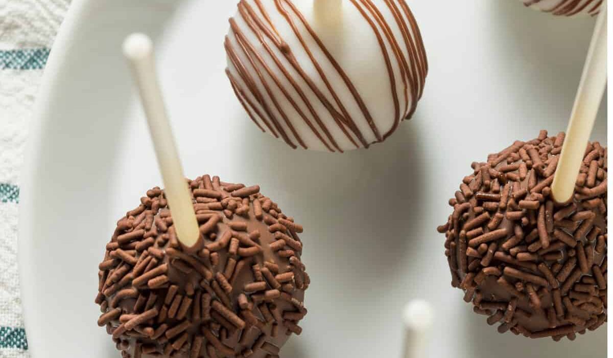 Overhead image of cake pops on a white plate