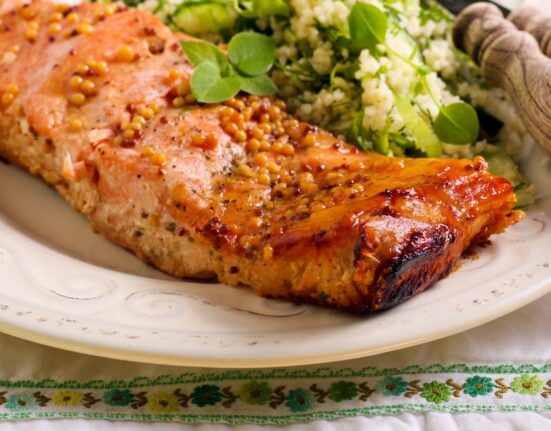 Hot Honey Salmon on a plate with veggies