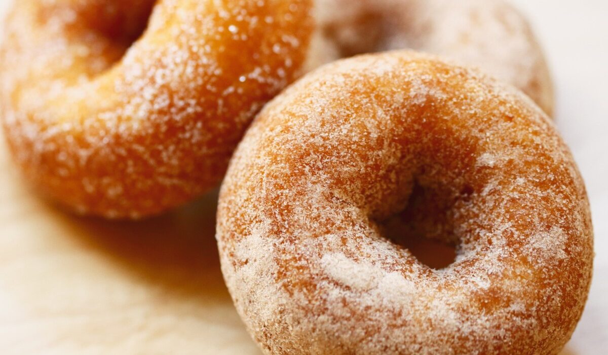 Keto Donuts on a neutral wooden surface