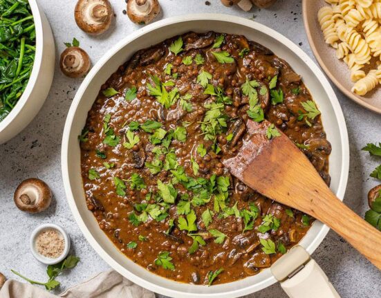 Lentil and Mushroom Stroganoff in a skillet on the table.