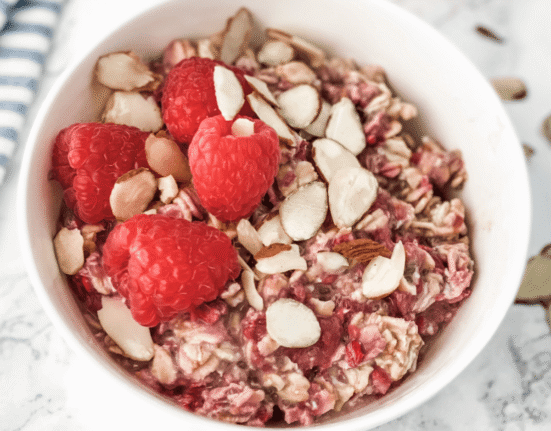raspberry overnight oats in a white bowl