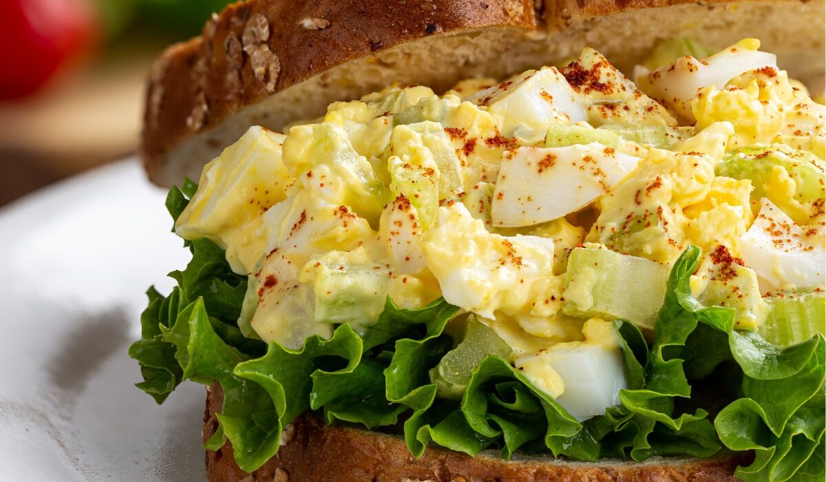 Close up image of an Egg Salad Sandwich on wheat bread