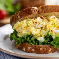 Close up image of an Egg Salad Sandwich on wheat bread