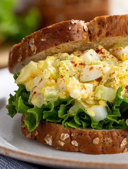 Close up image of an Egg Salad Sandwich on wheat bread