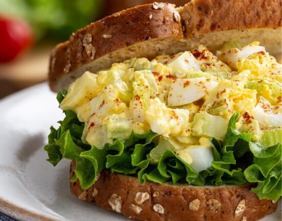 Close up image of an Egg Salad Sandwich on wheat bread
