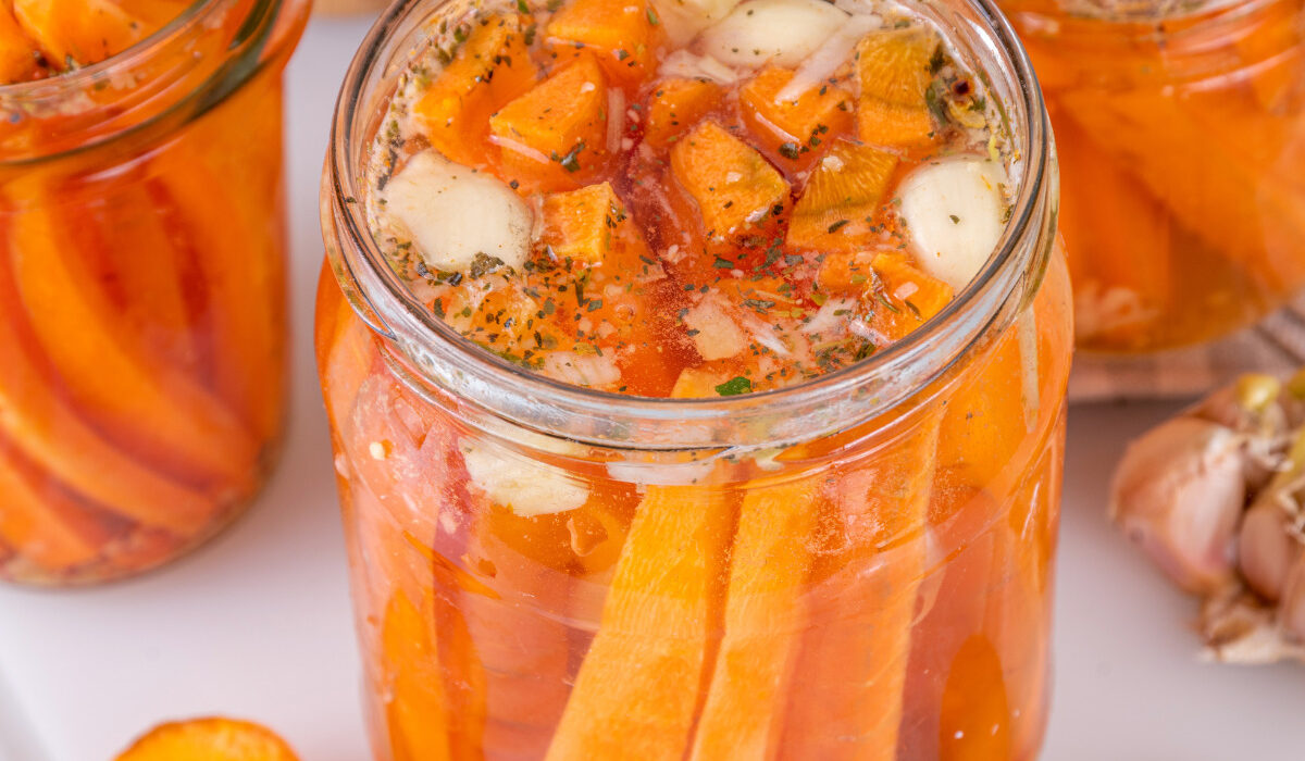 Pickled carrots in glass jars