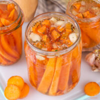 Pickled carrots in glass jars