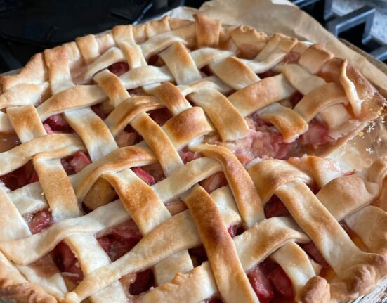 Rhubarb Pie cooling on a stovetop