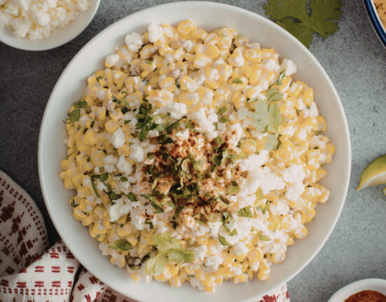 Overhead image of Mexican Street Corn Salad in a white bowl