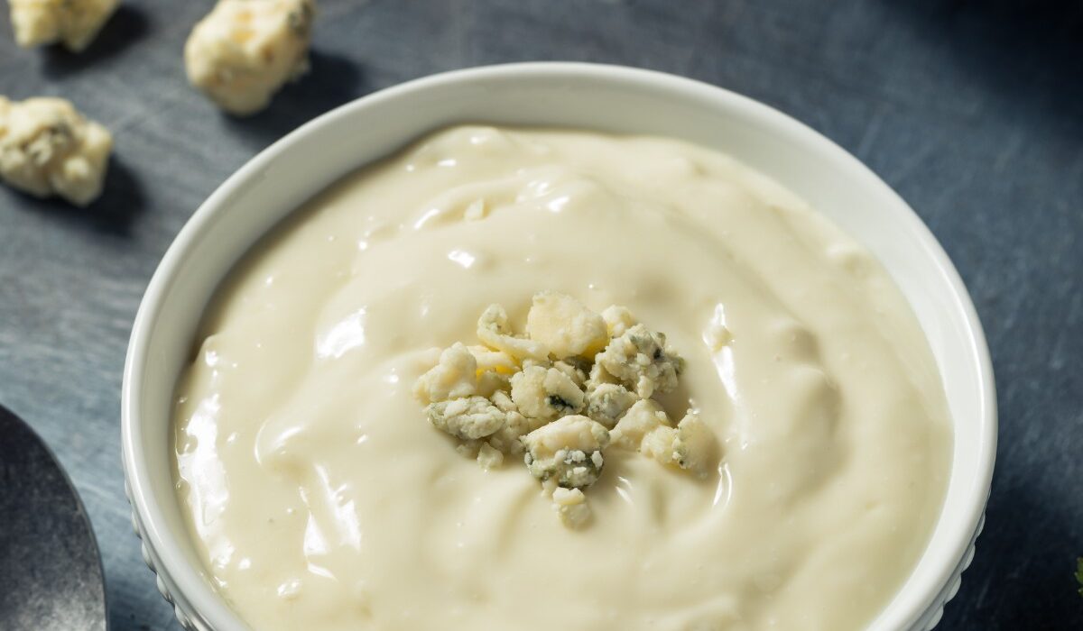 Close up image of blue cheese dressing in a bowl