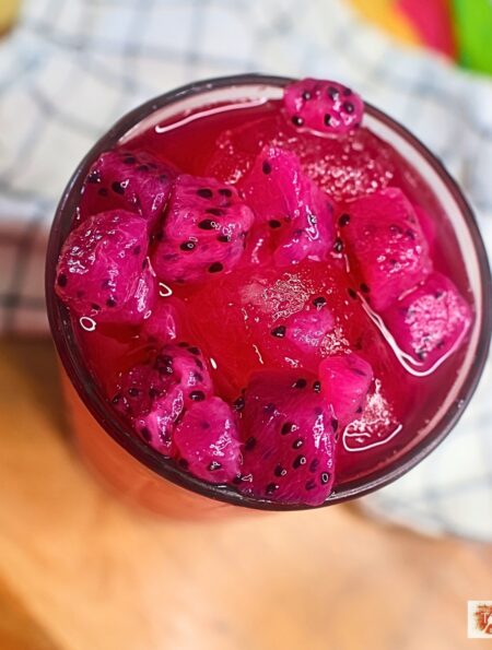 Overhead image of a Mango Dragonfruit refresher in a glass